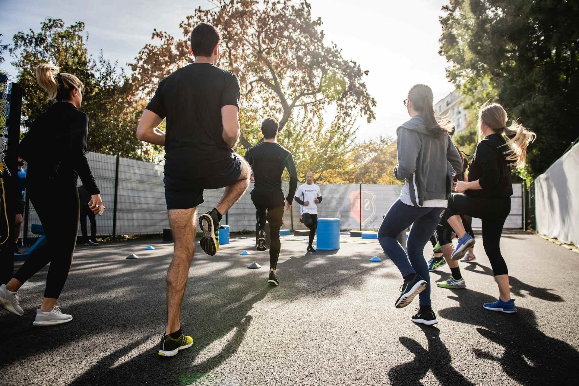 A group of people exercising on the road